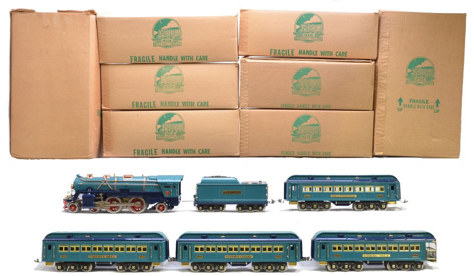 MTH 392 392T Blue Comet Colors MIB: MTH standard gauge passenger set in Blue Comet colors including; 392 steam 2-4-2 loco and a 392T tender with brass and copper trim in OBs and master carton and four passenger cars including; 424 Liber