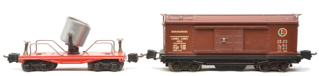 Lionel 3814 Merchandise w/Decals 2620 Searchlight: Lionel prewar O gauge 3814 Merchandise car, the version with decals and a 2360 red searchlight car. The 3814 has some spots on the roof and is C6-7. The 2360 is C7.