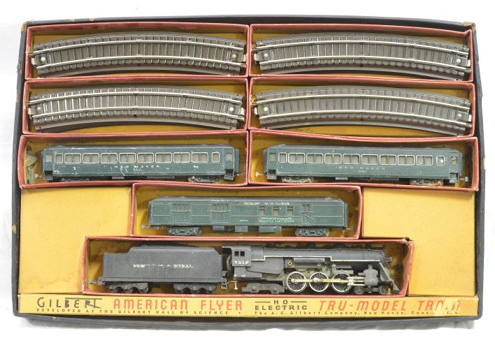 Gilbert AF HO NH Pass Set 5318 2764 2-8302 OB: A.C. Gilbert American Flyer HO gauge dark green New Haven passenger set in OB with original cardboard inserts containing; 5318 black 4-6-4 steam loco with a New York Central tender, 2764 baggage, two 