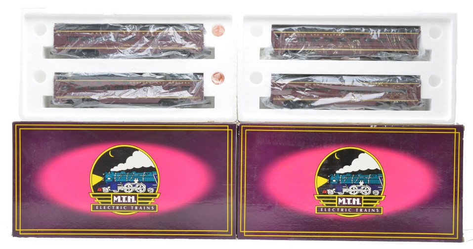 MTH two MT-6114 N&W 60Õ Sleeper/Diner Sets OBs: MTH two MT-6114 Norfolk & Western 60Õ aluminum sleeper/diner sets in OBs. One set has never been run and is C9-10. The other set has light run time, C8.