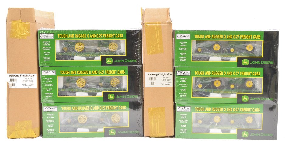 RK MTH John Deere 30-7027 30-7028 Flats Tractors: Rail King by MTH John Deere 30-7027 three car flatcar set with 4010 tractors and 30-7028 three car flatcar set with Model A tractors, both factory sealed in outer shipping cartons, C10.