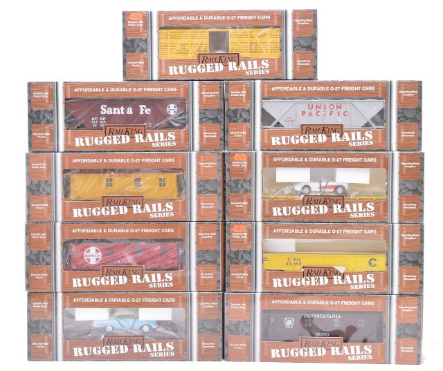 RK RR 33-7603 30-7602 30-7702 33-7504 33-7503: Rail King Rugged Rails freight cars including; 33-7603 Chessie flat with Road Legends 1957 Corvette, 30-7602 Southern Pacific flat with Road Legends 1957 Chevy, 30-7702 Chicago North Western stock car