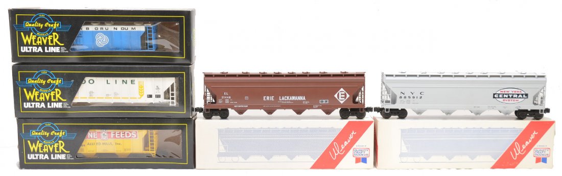 Weaver Freights 74866 62244 5214 32 885912: Weaver freight cars including; 74866 PS-2 Soo Line central discharge hopper, 62244 Wayne Feeds PS-2 covered hopper, 5214 Carborundum PS-2 covered hopper, 32 Erie Lackawanna ACF center flow covered hop