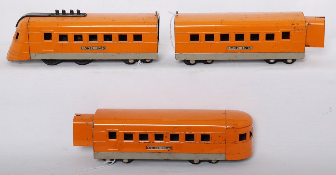 Lionel Jr. streamline passenger train orange: Prewar Lionel O gauge Lionel Jr. streamline passenger train set in Hiawatha orange and gray, C6. 1700E powered unit, 1702 coach, 1703 observation.