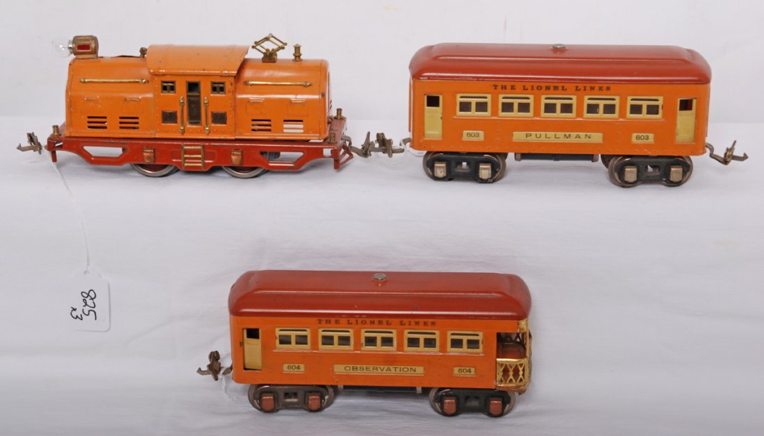Lionel promotional set with 250, 603 and 604 passe: Prewar Lionel O gauge promotional set featuring an orange 250 center cab electric locomotive with 603 Pullman (nickel journals) and a 604 observation (copper journals), C6.