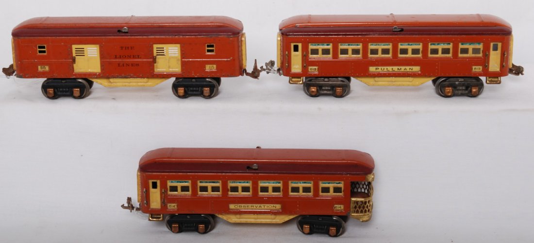Lionel terra cotta and maroon passengers, 613, 614: Prewar Lionel O gauge 613 Pullman, 614 observation, and 615 baggage, passenger cars in terra cotta and maroon, 614 and 615 have repainted roofs, C5-6.