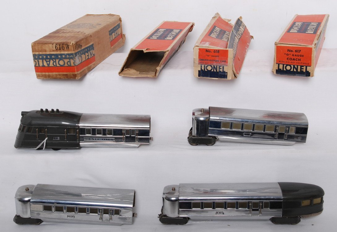 Lionel Gun Metal Gray Flying Yankee streamline pas: Prewar Lionel O gauge Gun Metal Gray Flying Yankee streamline diesel passenger train in original boxes, C6. 616W powered unit, two 617 coaches, and a 618 observation (spot with loss of paint that has 