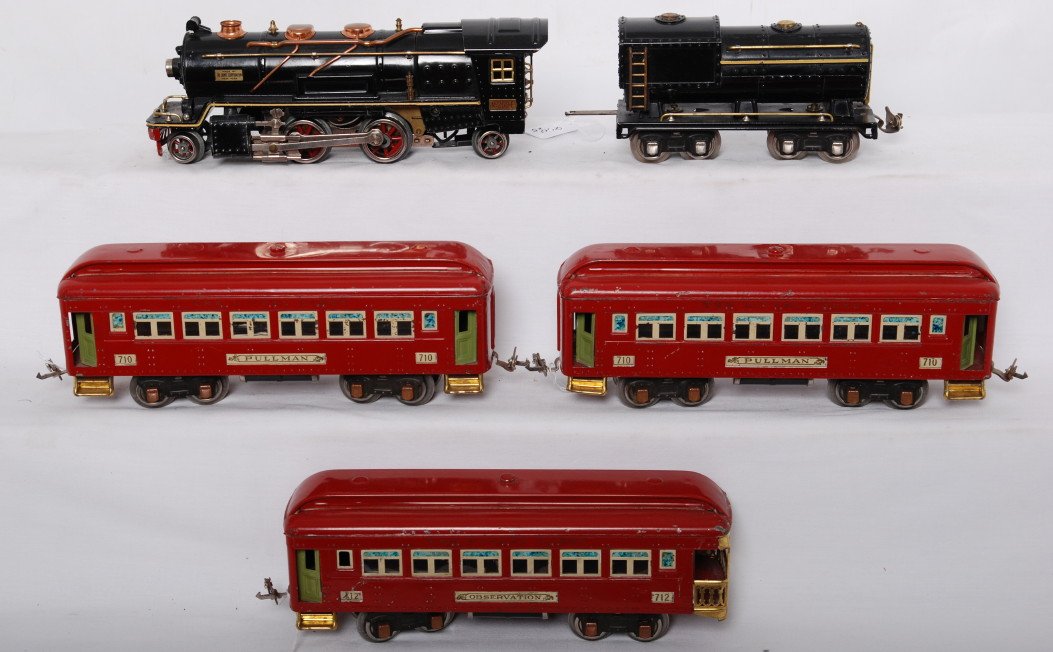 Lionel 260E w/tender, two 710, 712 steam passenger: Prewar Lionel O gauge 260 steam locomotive and tender with two 710 Pullman, and 712 observation, C6. Loco has solder repaired pickup rollers.