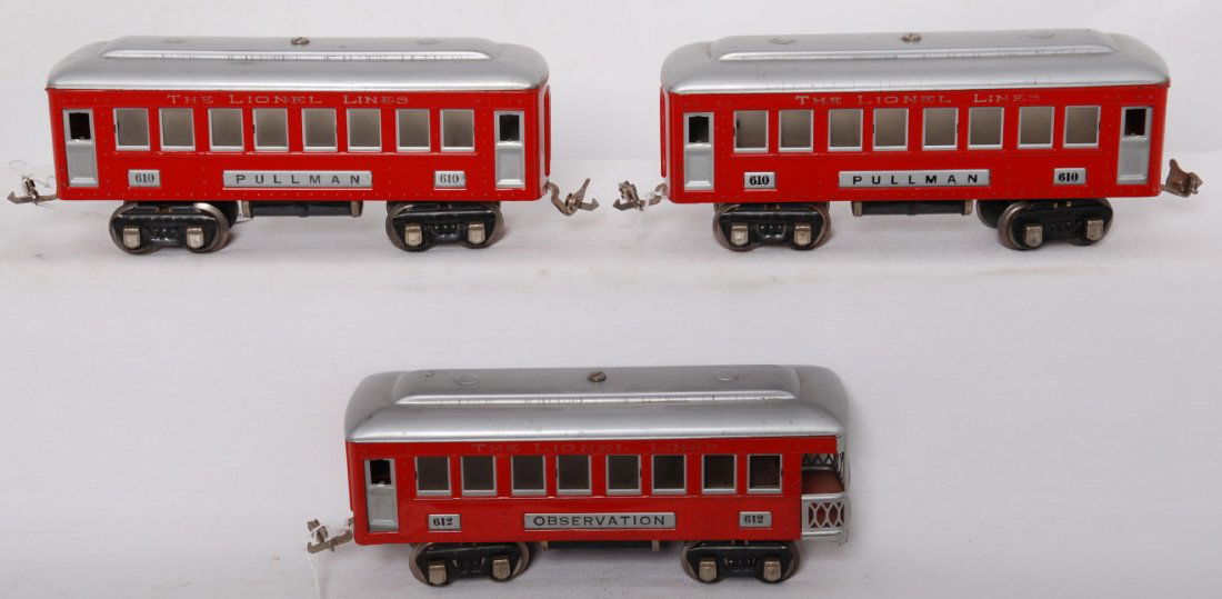 Lionel 610, 610, 612 red and silver passenger cars: Prewar Lionel O gauge red and silver passenger cars, strong lettering, nicer C6+. Two 610 Pullman and 612 observation.