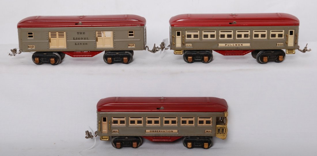 Lionel 600, 601, 602 passenger cars: Prewar Lionel O gauge gray and red passenger cars, 600 Pullman, 601 observation, and 602 baggage, C6-7.