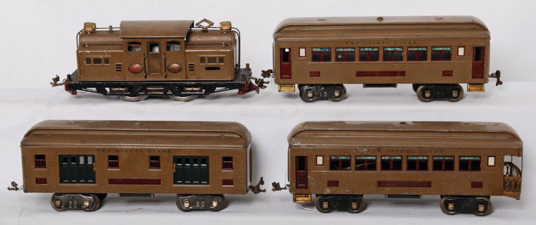 Lionel 318E, 309, 310, 312 passenger set: Prewar Lionel standard gauge 318E center cab electric locomotive (rewheeled) with 309 Pullman, 310 Railway Mail, and 312 observation. Trains should clean and polish C6, surface rust on trim.