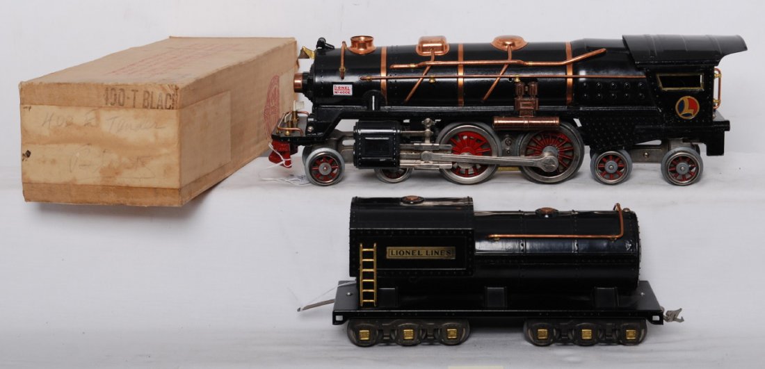 Lionel 400E and 400T loco and tender w/tender OB: Prewar Lionel standard gauge 400E steam locomotive and 400T tender, nicer C7. Loco has two original drive wheels, rest of all wheels are replaced. Tender box has some old brown paper tape with a littl