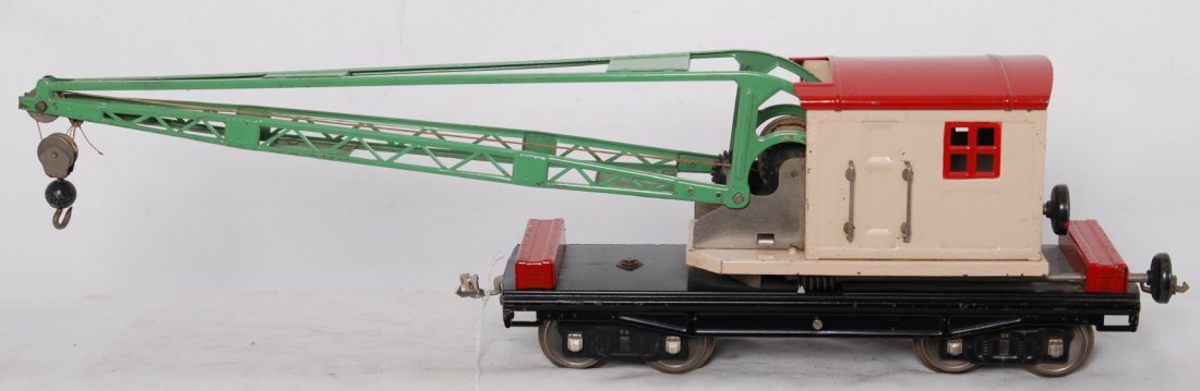 Lionel No. 219 operating work crane cream and red: Prewar Lionel standard gauge No. 219 operating work crane with cream cab, red roof and tool boxes, C6.