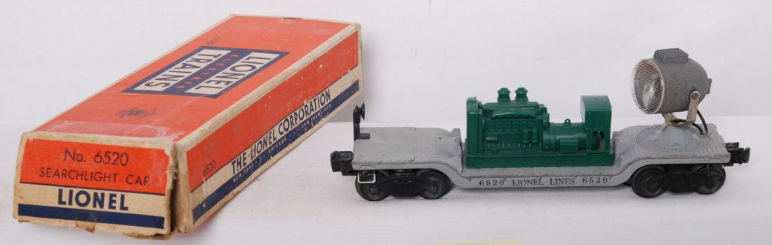 Lionel 6520 searchlight car w/green generator in: Postwar Lionel O gauge 6520 searchlight car with green generator in original box, C7. Box has tears, tape repairs, missing flaps.