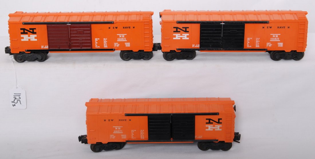 Lionel 6468-25 New Haven boxcar variations: Postwar Lionel O gauge 6468-25 New Haven double door automobiles boxcar with Tuscan brown doors on both sides, 6468-25 New Haven... w/half serif, and 6468-25 New Haven... w/full serif, boxcars look C6