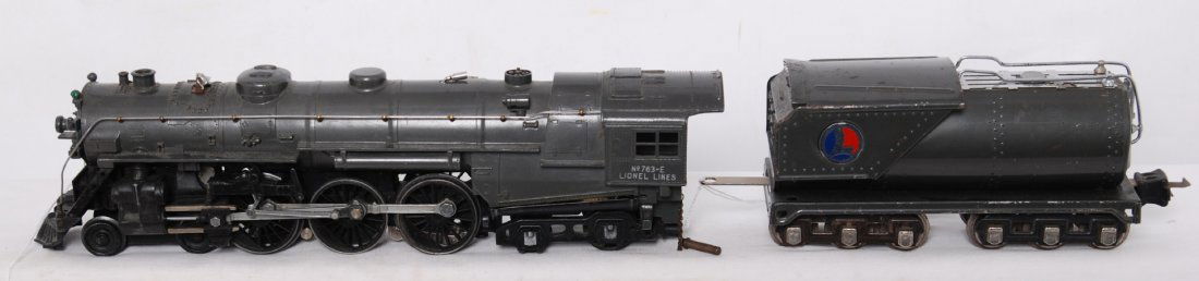 Lionel 763-E steam w/263W whistle in Gun Metal: Prewar Lionel O gauge 763-E steam locomotive with 263W whistle tender in gray. Loco looks C7 with a bit of rust on bell trim. Tender looks C6 area.