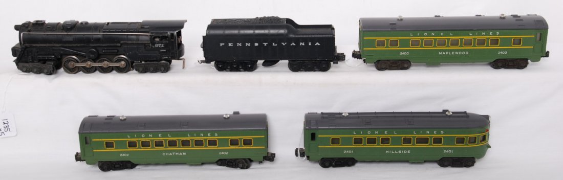 Lionel 2140WS 671, 2671W PRR, 2400, 2401, 2402: Postwar Lionel O gauge 2140WS steam passenger set with 671 steam locomotive and 2671W Pennsylvania whistle tender with 2400 Maplewood Pullman, 2401 Hillside observation, and 2402 Chatham Pullman. Loco