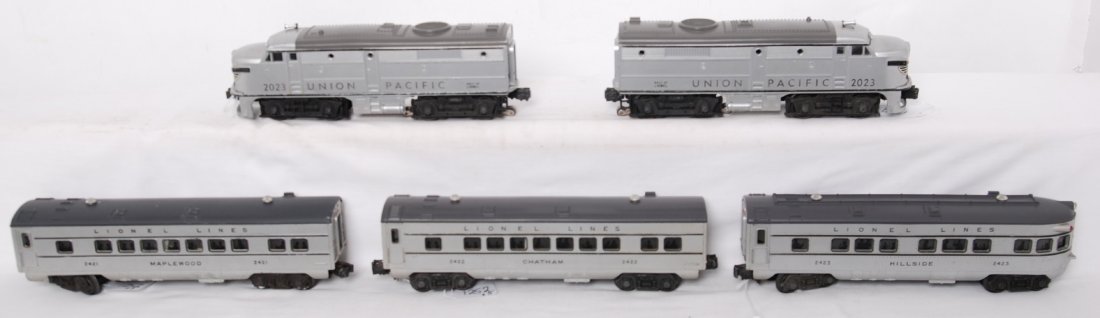 Lionel 2023 U.P. with 2421, 2422, 2423 passenger : Postwar Lionel O gauge 2023 Union Pacific Alco diesel locomotive A units with 2421 Maplewood Pullman (repainted roof), 2422 Chatham Pullman, and 2423 Hillside observation, C6-7. Loco instructions shee