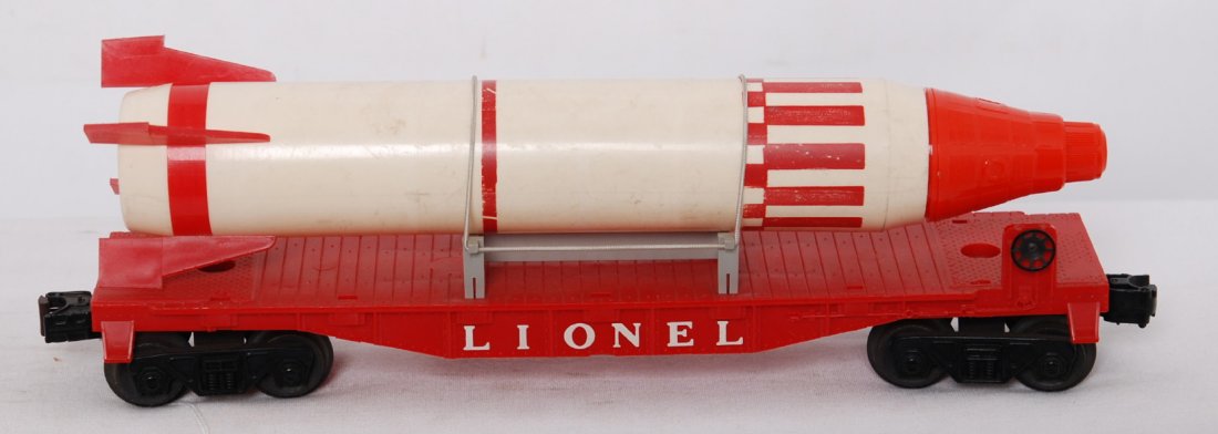 Lionel 6407 flatcar with rocket Sterling pencil s: Postwar Lionel O gauge 6407 flatcar with Sterling rocket with red Sterling Plastics pencil sharpener. Flatcar should clean C7-8. Rocket is marked Sterling, sharpener is marked Sterling Plastics, shavi