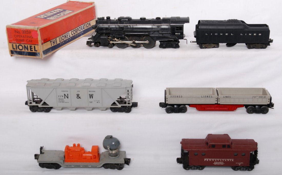 Lionel 646, 2046W, 3359, 6446, 3620, 6417: Postwar Lionel O gauge 646 steam locomotive C6; 2046W whistle tender, hairline at front screw, C7; 3359 twin bin operating dump car, C6-7; 6446 N&W cement car, unrun C8-9; 3620 searchlight car, C7; an