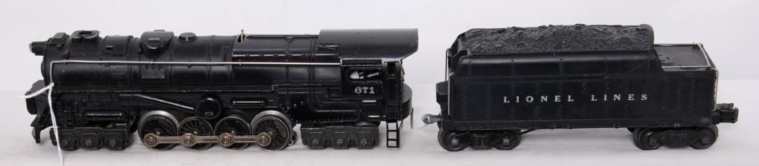 Lionel 671 steam loco and 671W whistle tender: Postwar Lionel O gauge 671 steam locomotive with 671W whistle tender. Tender has hairlines, repairs?, repainting to front of shell, otherwise trains look C6.