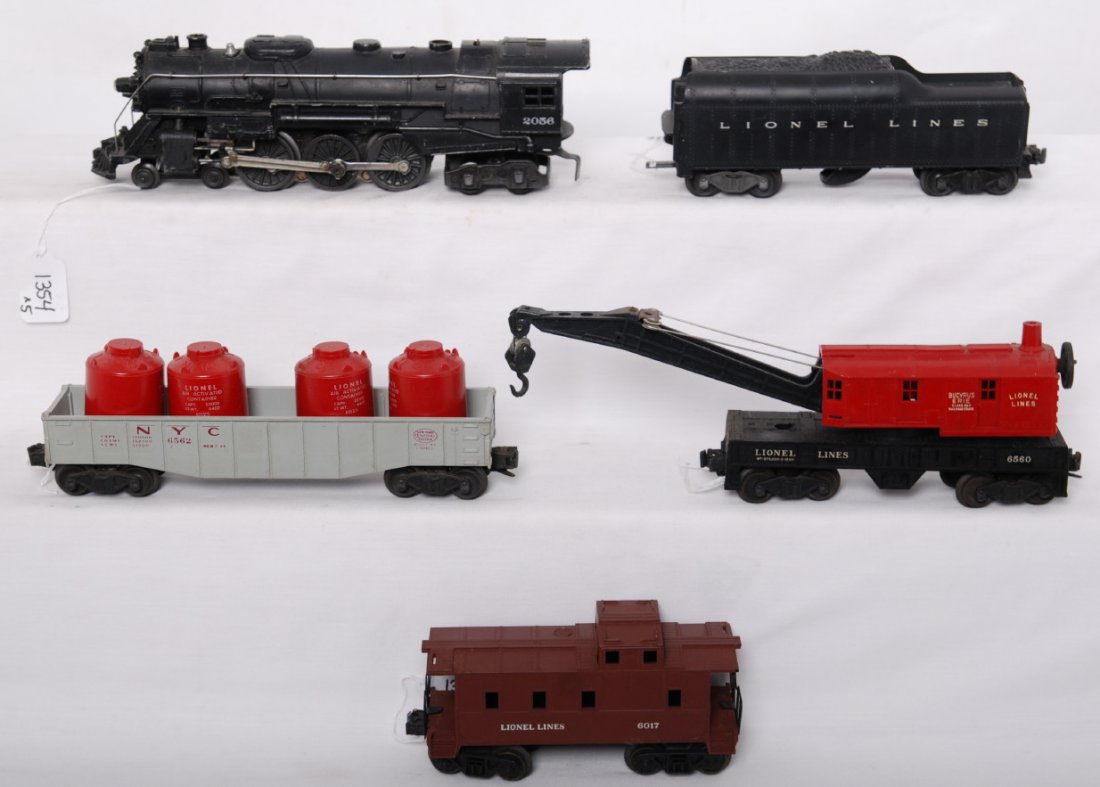 Lionel 2056, 2046W, 6560, 6562, and 6017: Postwar Lionel O gauge 2056 steam loco, 2046W whistle tender, 6560 operating work crane, 6562 NYC gondola w/red canisters, and 6017 caboose, C6 area with some surface rust here and there on underside 