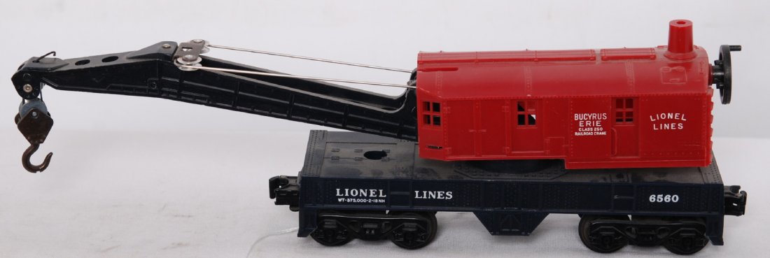 Lionel 6560 operating crane, Hagerstown blue fram: Postwar Lionel O gauge 6560 operating work crane with Hagerstown dark blue frame. Frame has all four steps with corner cut off. Train otherwise looks C7 area and will clean to look better. Although st