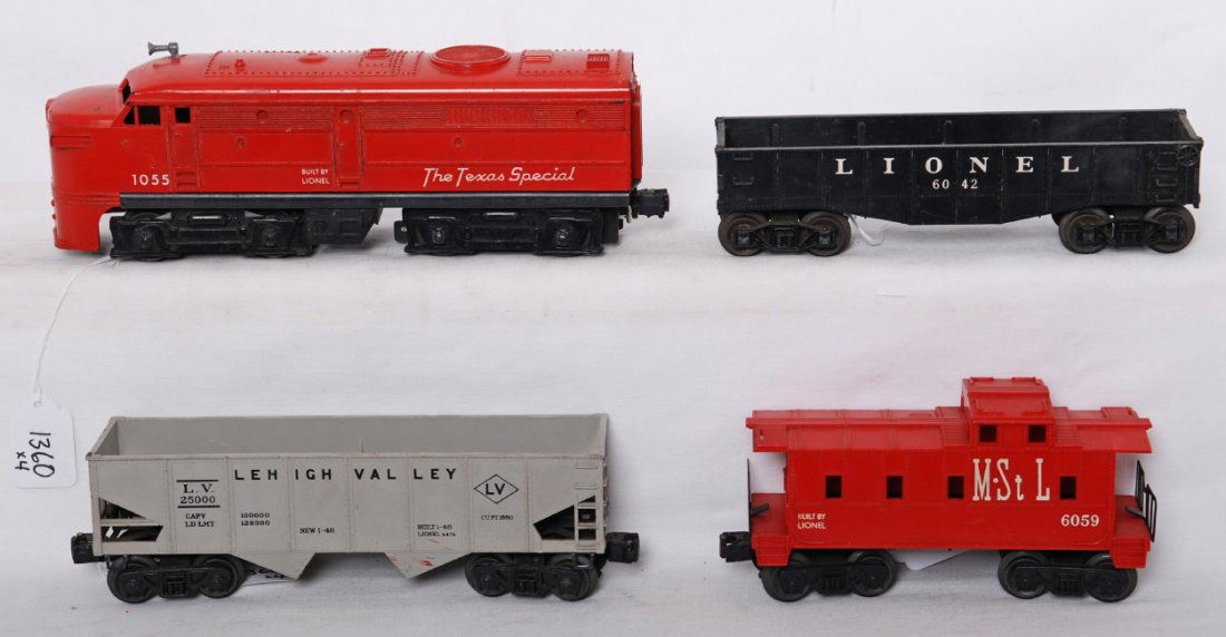 Lionel 1055, 6476, 6042, and 6059 diesel freight: Postwar Lionel O gauge 1055 MKT The Texas Special diesel Alco A unit, 6042 gondola, 6476 Lehigh Valley hopper, and 6059 M.St.L. caboose, C6.