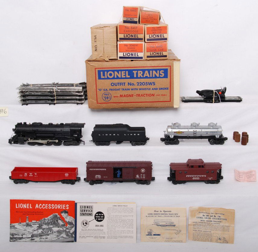 Boxed Lionel 2205WS freight train w/whistle and s: Postwar Lionel O gauge 2205WS O GA. freight train with whistle and smoke in original boxes with components and paper literature. Set is comprised of 736 steam locomotive with instructions sheet, 2046W