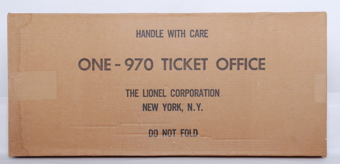 Lionel 970 ticket office in factory sealed origin: Postwar Lionel 970 ticket office in factory sealed original box, slight staining to one end, O/W C8 package.