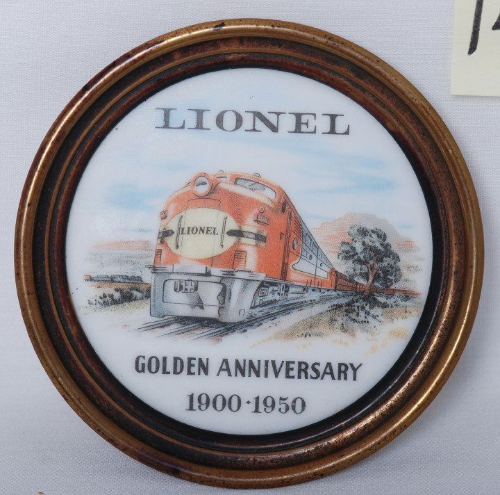 Lionel Golden Anniversary 1900-1950 coaster: Postwar Lionel Golden Anniversary drink/cocktail coaster. Nice patina on metal band. Ceramic bottom shows no wear.
