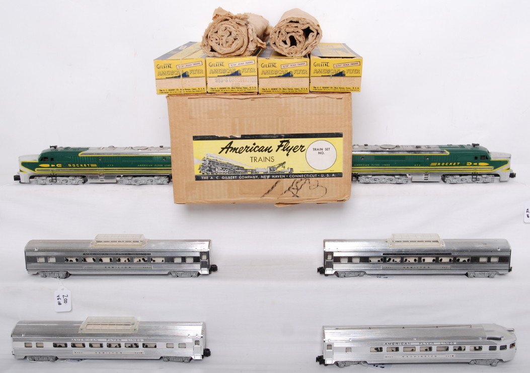American Flyer K5364W Silver Rocket set: American Flyer postwar S gauge K5364W Silver Rocket passenger set in OBs. Includes 474 / 475 power and dummy Alco A-A pair with wrap. Passenger cars include three 962 vista domes and 963 observation. 