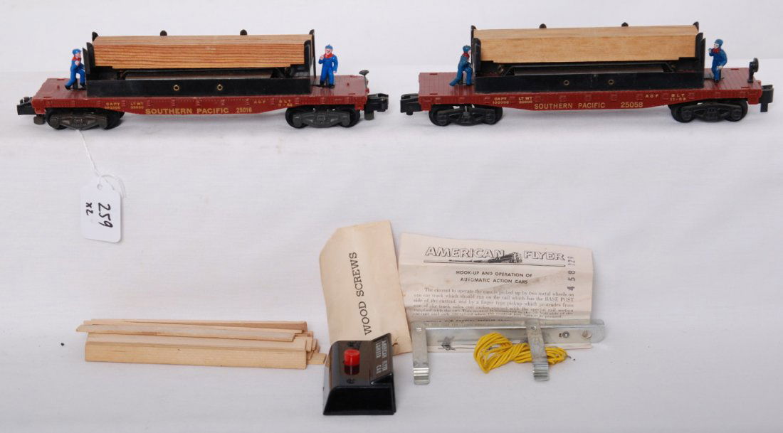 American Flyer 25016 and 25058 operating lumber ca: American Flyer postwar S gauge operating Moe and Joe lumber cars. Includes 25016 and 25058. Also included is one control button, one power rail, one pack of screws, fifteen boards, and one instruction