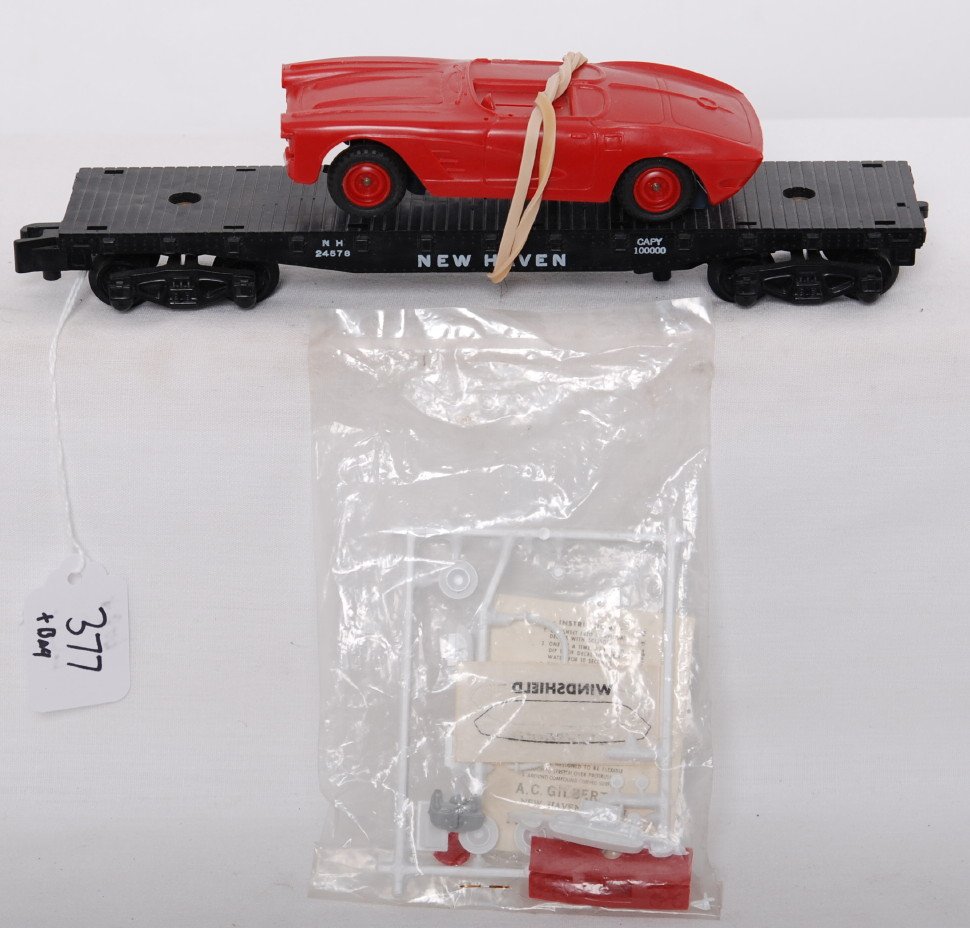 American Flyer 24578 New Haven flat with Corvette: American Flyer postwar S gauge 24578 New Haven flat with Corvette racer. Flat is C7-8. Car is C8-9 with decals and most original plastic parts still attached to sprue.