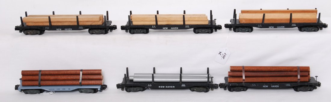 6 American Flyer flats 928, 905, 24537, etc: American Flyer postwar S gauge flats. Six flats include four 928 New Haven three plastic body, one diecast, American Flyer Lines 905, and New Haven 24537. Cars are generally C7 with good steps.