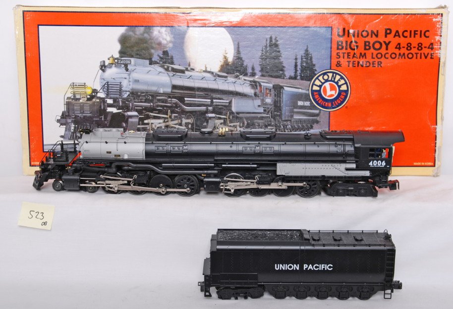 Lionel 28029 Union Pacific Big Boy: Lionel modern O gauge 28029 Union Pacific Big Boy steam locomotive in OB. Loco features TMCC, Railsounds, Electrocoupler, fan driven smoke unit and much more. Loco is C8 with run time. Loco box has we