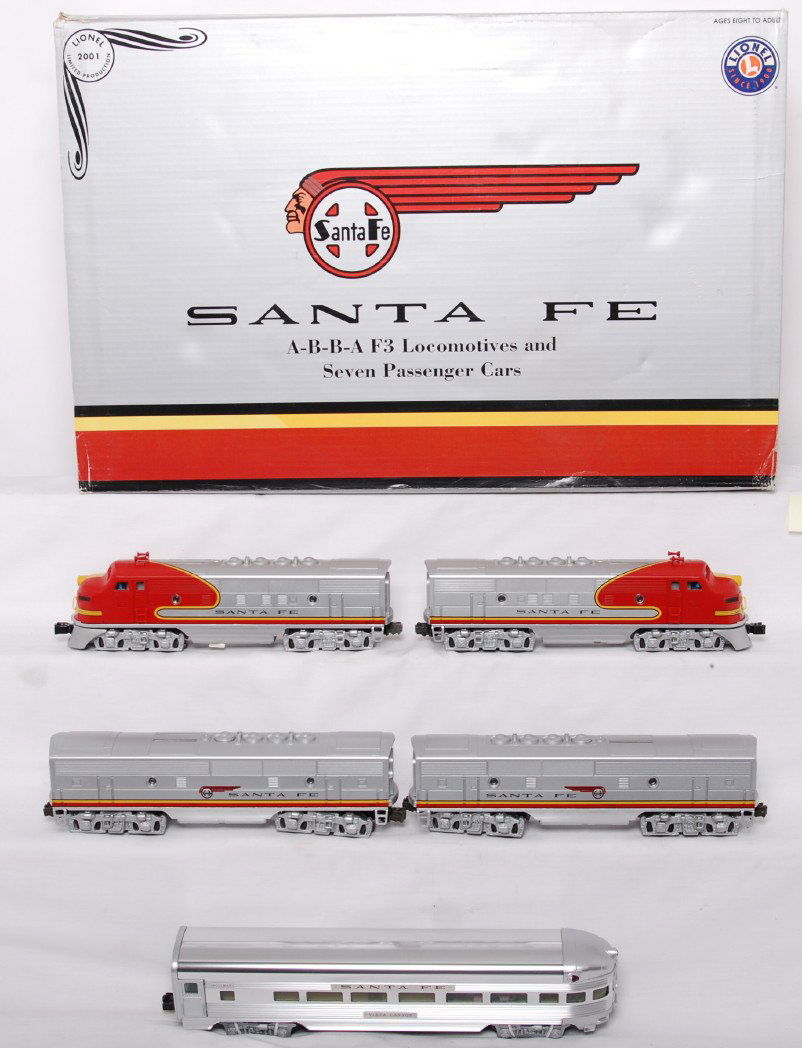 Lionel 21786 Santa Fe Super Chief set: Lionel modern O Gauge 21786 Santa Fe A-B-B-A F3 locomotives and seven Santa Fe aluminum passenger cars set in original box. Set includes 14504 S.F. F3A powered unit w/TMCC, 14505 S.F. F3B dummy unit w