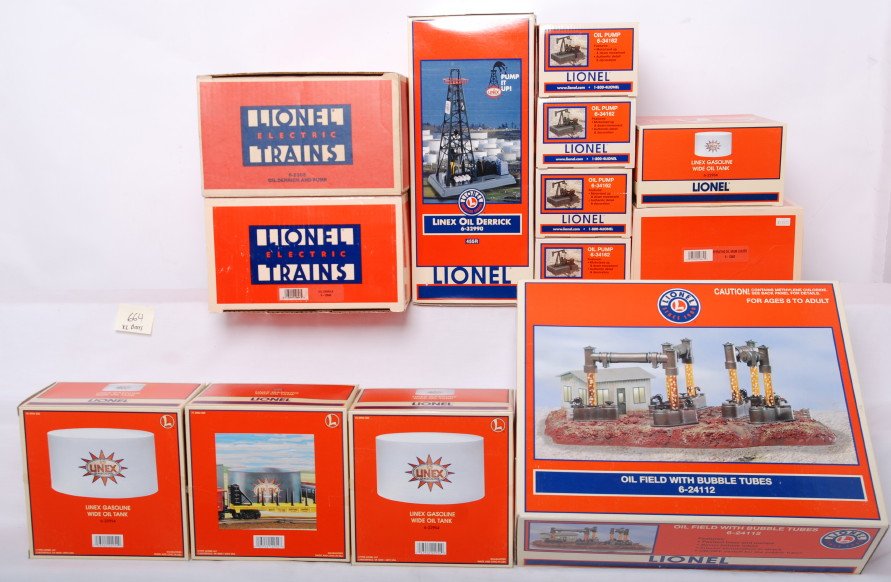 Lionel oil related accessories, 24112, 32990, 2305: Lionel modern O gauge instant oil field! Great oil accessories in this lot. Includes 24112 oil field, 32990 Linex oil derrick, 12848 oil derrick, four 34162 oil pumps, 12954 Linex oil tank, three 2295