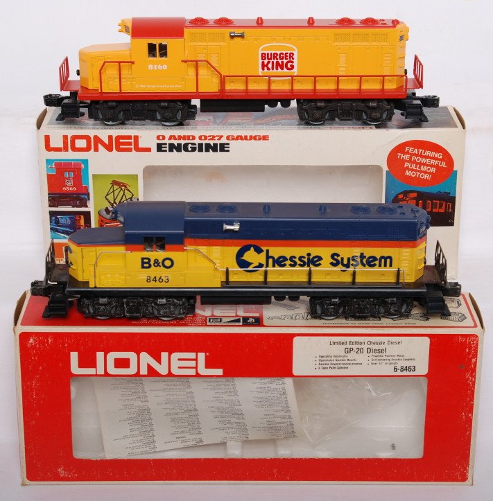 Lionel Chessie and Burger King GP-20 locos: Lionel modern O gauge diesel locomotives in OBs. Includes 8463 Chessie GP-20 and 8160 Burger King GP-20. Chessie loco is C7-8 with run time and some light paint chipping on the trucks. Burger King loc