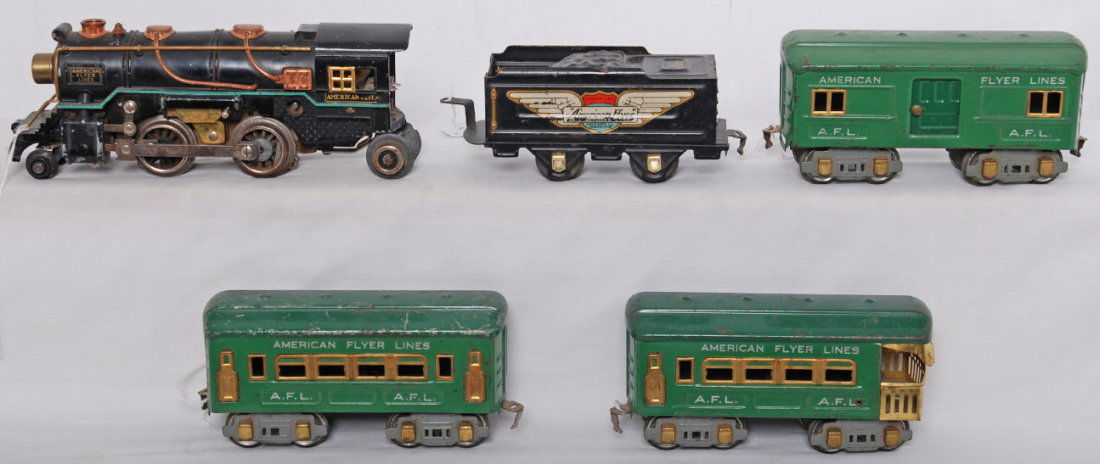 American Flyer loco and tender w/3150, 3151, 3152: Prewar American Flyer O gauge unnumbered steam locomotive with some fatigue to wheels, 3189 tinplate tender, 3150 baggage, 3151 coach, and 3152 observation, passenger cars, C5-6. Passenger cars are il