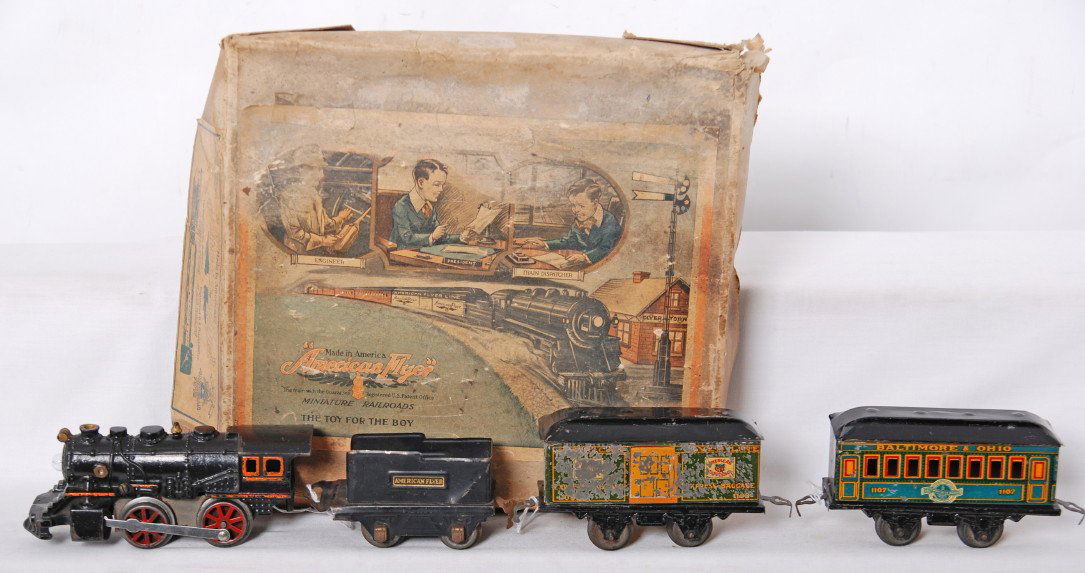 American Flyer early O gauge electric passenger in: Prewar American Flyer O gauge steam passenger set in original box. Set is composed of an unnumbered cast iron steam locomotive with tinplate tender, 1108 baggage, and 1107 Baltimore and Ohio passenger