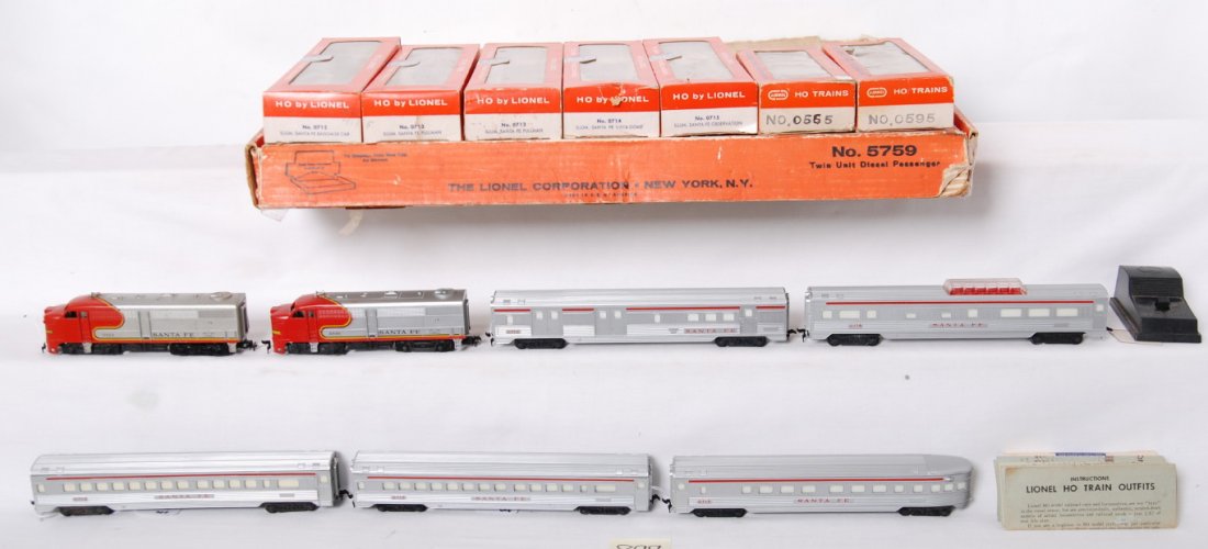 Lionel HO outfit No. 5759 twin unit diesel passeng: Postwar Lionel HO gauge outfit No. 5759 twin unit diesel freight set in original boxes with instructions sheets and 0147 controller. Set is comprised of the following trains: 0565 and 0595 Santa Fe Al