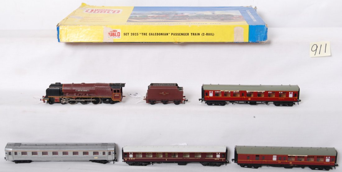 Hornby Dublo HO 2023 The Caledonian in OB: Postwar Hornby Dublo HO gauge set number 2023 The Caledonian passenger train in original box. Set contains 46245 City of London diecast steam locomotive with British Railways tinplate and diecast tend