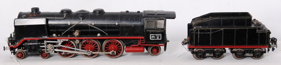 Marklin 20 Volt B HR 70/12920 steam locomotive and: Postwar Marklin O gauge 20 Volt B HR 70/12920 steam locomotive and tender. Tender has touchups and needs cleaned. Train should clean to look C6-7.