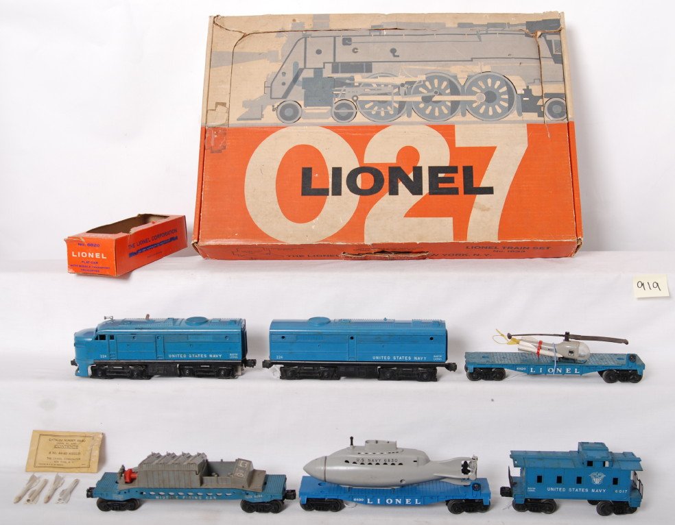 Boxed Lionel 1633 twin unit diesel freight set in : Postwar Lionel O gauge 1633 twin unit diesel freight set in original box with 224 United States Navy Alco diesel A-B units with 6820 flatcar with missile transport helicopter in partial OB, 6830 flatc
