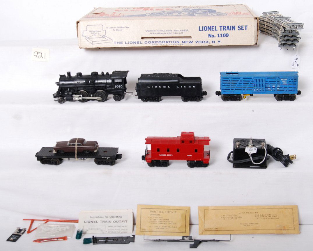 Lionel 1109 The 2-4-2 Steam Freighter set in OB: Postwar Lionel O gauge 1109 The 2-4-2 Steam Freighter set in original box with track, transformer, and components. 1060 steam loco, unnumbered streamline tender, 3386 Bronx Zoo giraffe car, 6404 flatc