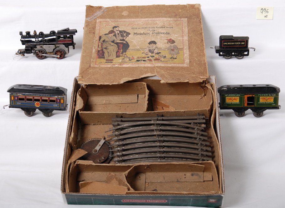 American Flyer prewar passenger set: American Flyer prewar O gauge set in OB. Includes electric 0-4-0 steam locomotive American Flyer Lines 120 tenderm 1105 American Flyer Lines baggage, and 1203 American Flyer coach. Trains are C6 area,