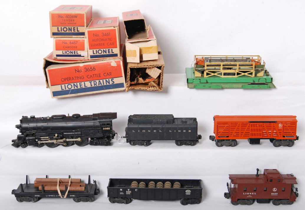 Lionel 2055, 6026W, 3656, 6462, 3461, 6457: Lionel Postwar O gauge loco and cars in OBs. Includes 2055 with insert and piece of wrap, 6026W tender, 3656 operating stock car and corral, 6462 New York Central gondola, 3461 Lionel Lines operating