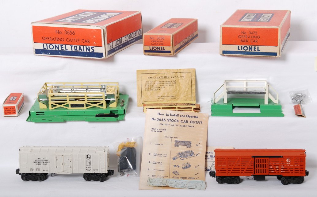 Lionel 3472 milk car and 3656 stock yard in OBs: Lionel Postwar O gauge operating cars in OBs. Includes 3472 milk car with 3472P platform. Also included is instruction sheet, seven cans, and can sleeve. Car is C7 area. OB has all flaps, but all have
