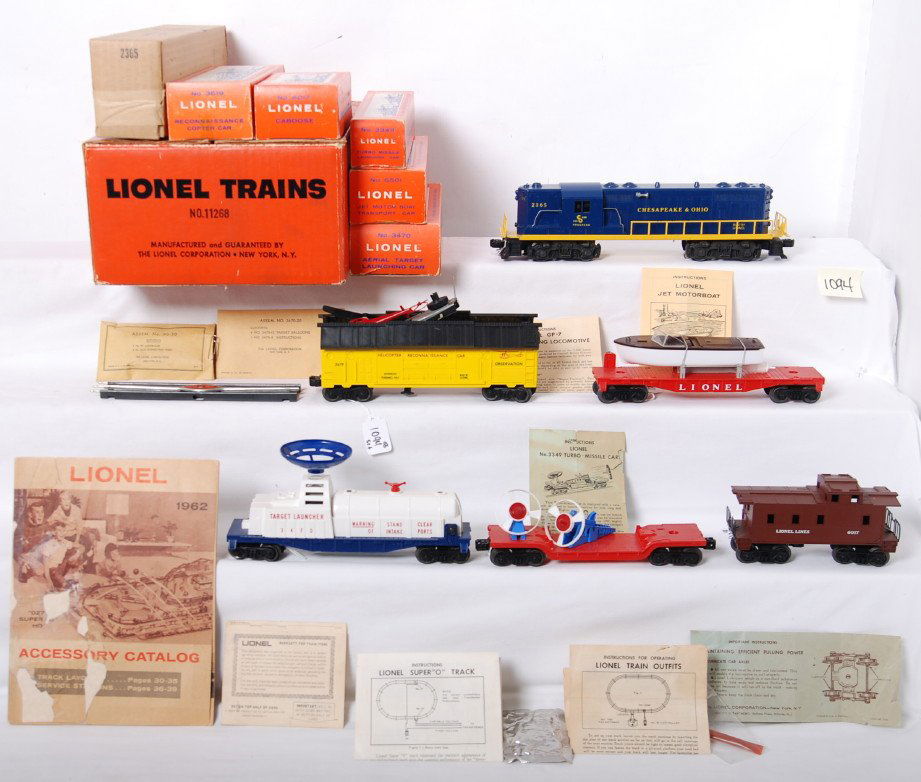 Lionel 11268 C&O GP-7 diesel freight set in OB: Postwar Lionel O gauge 11268 Chesapeake and Ohio GP-7 diesel freight set in original boxes, set is comprised of 2365 Chesapeake and Ohio GP-7 diesel road switcher locomotive with 3349 turbo missile la